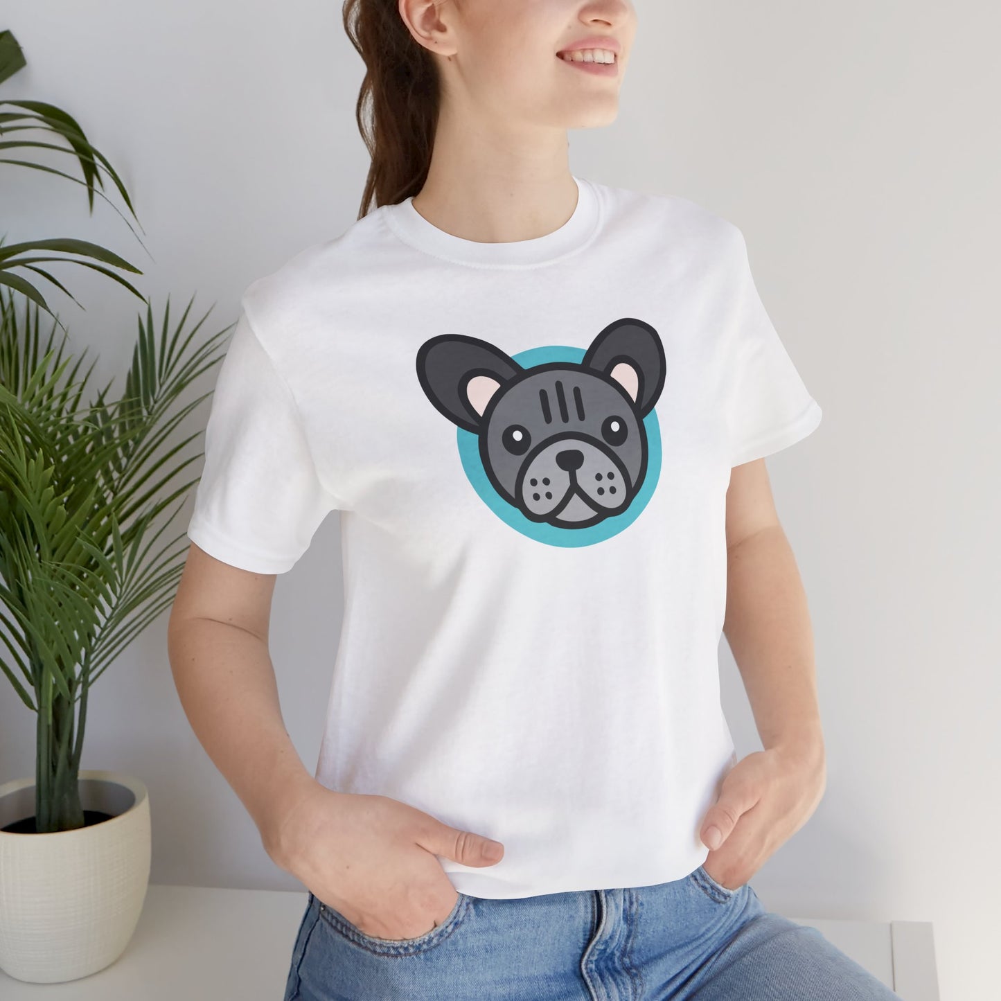 White t-shirt with an illustration of a blue frenchie on female model