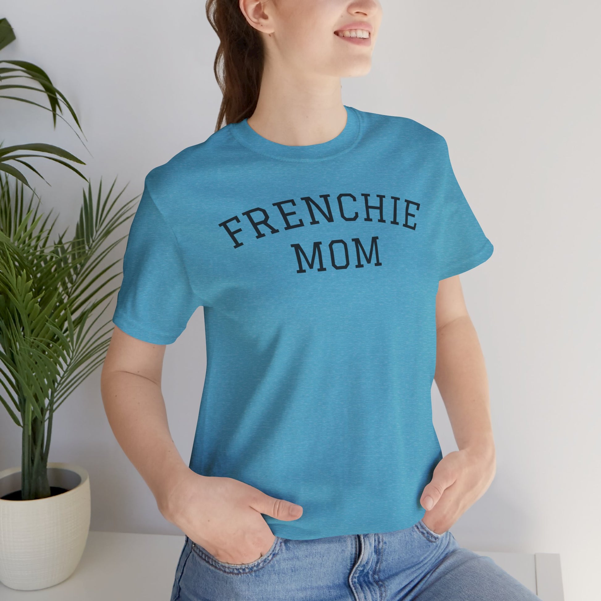 Heather Aqua t-shirt with the slogan "Frenchie Mom" on female model
