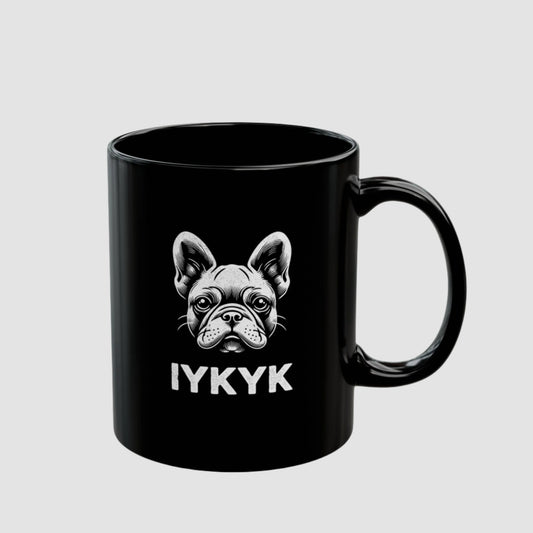 Black ceramic mug with white portrait of a French Bulldog and the slogan "IYKYK"