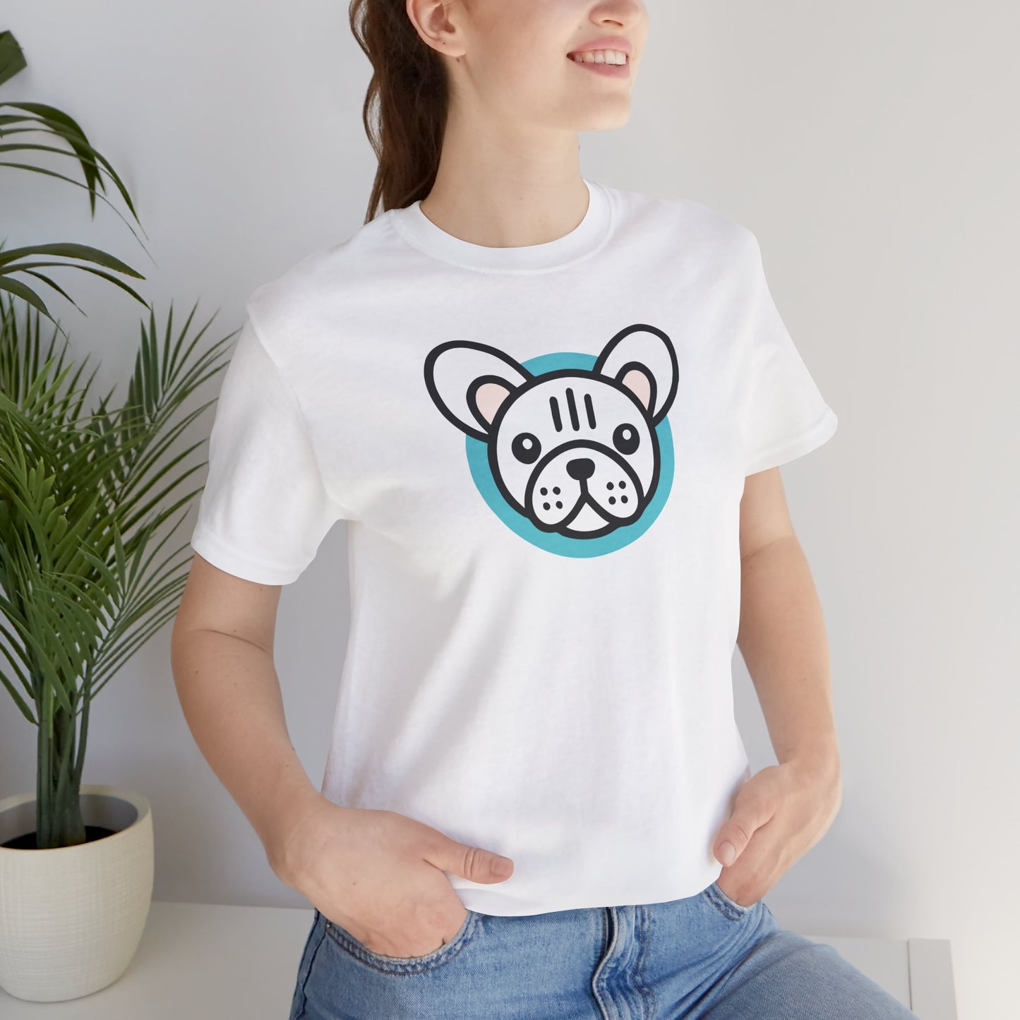 White t-shirt with an illustration of a white frenchie on female model
